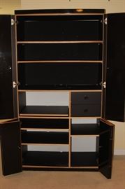 Inside black cabinet.