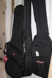 Multiple guitar bags.