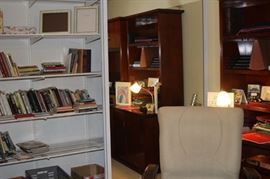 Books, bookcase, frames, storage boxes and files.