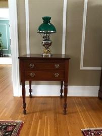 This is a lovely CHERRY, two drawer stand with Sheraton legs.  It appears much darker than it truly is. 
