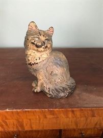 Cast iron "Kitty" doorstop.  Original surface and paint; unsigned; however, most likely Hubley.