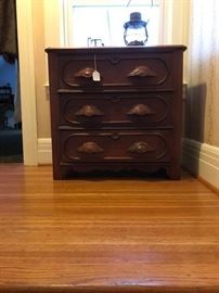Walnut three drawer Victorian era chest.  Original surface and very nice size to fit in most any space.