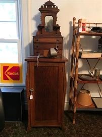 Eastlake style Salesman's sample dresser in walnut and original surface.  Below is a Oak, refinished record cabinet.  Also, many Kodak souvenir and memorabilia items in this sale.