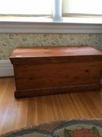 Small, refinished pine blanket box.
