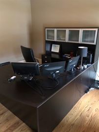 Office furniture and computer monitors.