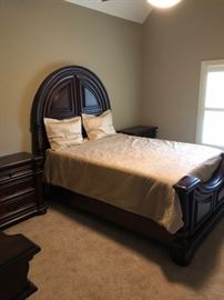 Bedroom suit including bed, side tables and chest of drawers. 
