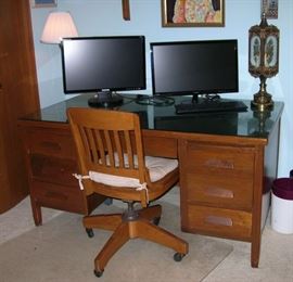 Fab vintage oak office desk and desk chair. Flat screen computer monitors.
