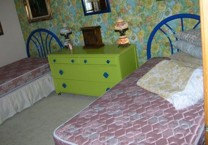 More twin beds. Really cool dresser.