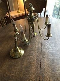 Brass light on antique oak table with leaf, four new chairs 
