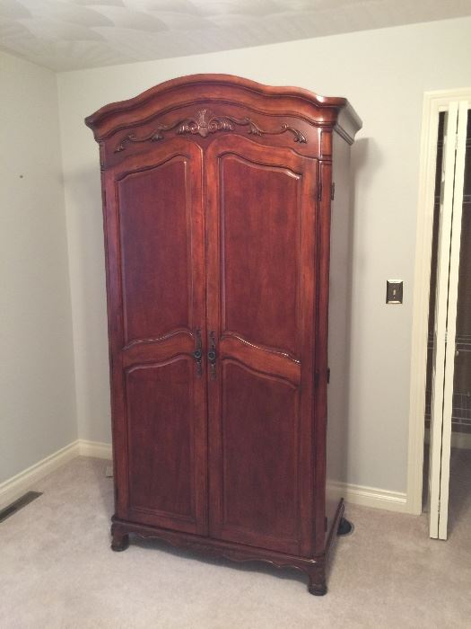 $350 Solid wood TV Armoire. Can be converted into a bar! Armoire measures 82”T x 40”W x 22”D
