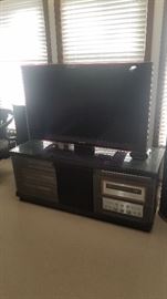 45 " Samsung TV. Wide TV stand.