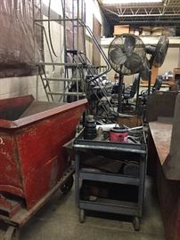 Industrial floor fans and metal carts 