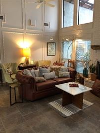 Chesterfield styled brown deep leather sofa. (Set up and Photo by BC)