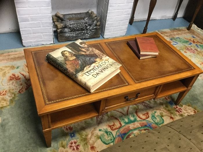 Vintage leather top coffee table.