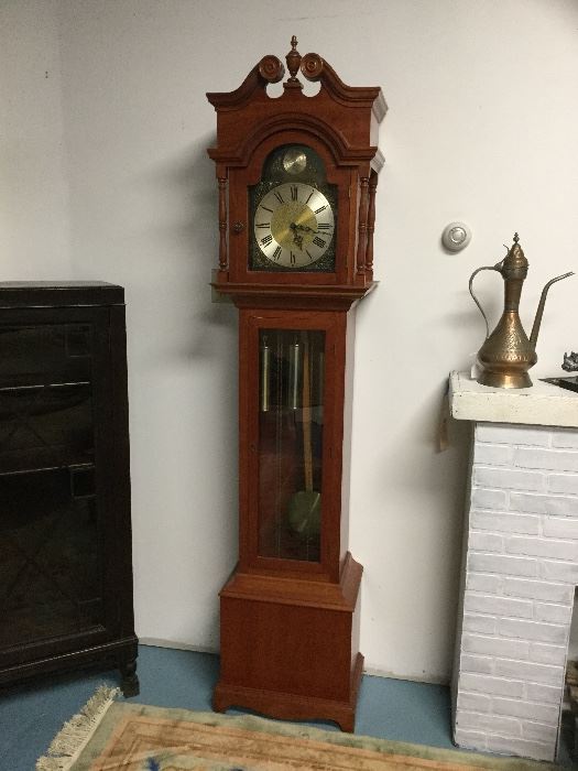 Mid-century cherry grandfather clock with Westminster chime. It works.