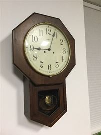 Howard Miller schoolhouse clock. It works well.