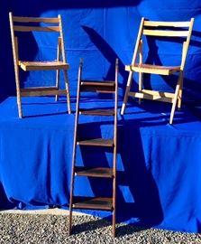 Vintage folding chairs and bunk ladder from the Queen Mary