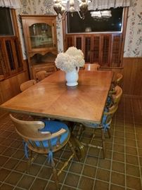 Dining room table with 6 chairs & cushions and 2 extra leafs; corner display cabinet