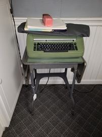 Typewriter and table