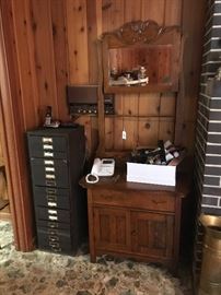 Metal filing cabinet with about 20 drawers