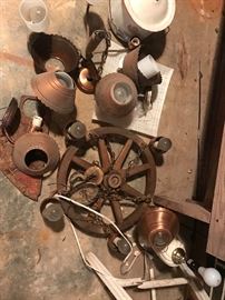 Wagon wheel and copper light fixture