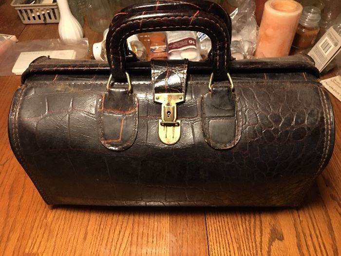 Leather doctor’s bag.