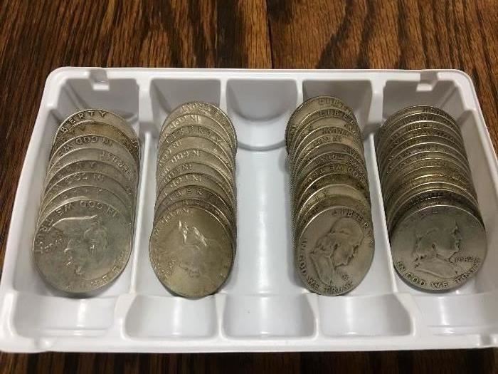 Franklin half dollar coins.