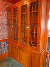 Antique oak cabinet with leaded glass doors