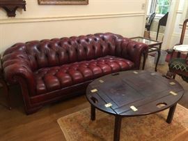 Beautiful Chesterfield Sofa! Pretty sure Einstein contemplated the Pythagorean Theorem from this leather sofa. 