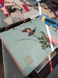 Scrapbook of vintage baby announcements and cards