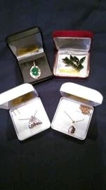 Diamond and precious stone necklaces, jade pin