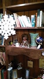 McCoy vase, gemstone globe, books and large snowflake