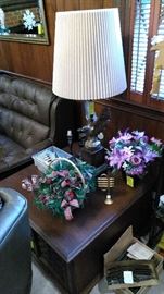 End table with eagle lamp and floral arrangements