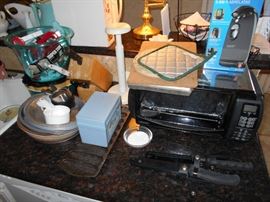 Many kitchen items and toaster oven