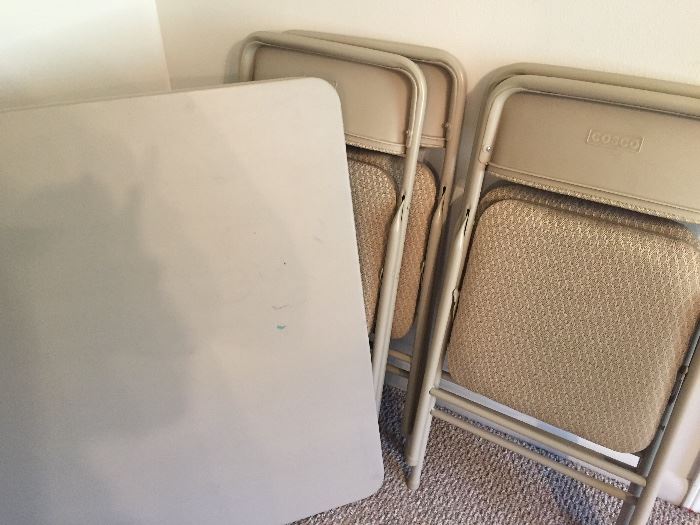 Folding table and 4 padded chairs