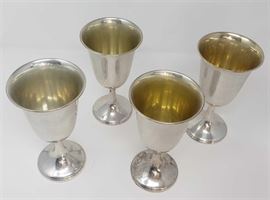 4 Sterling Goblets with Gold Wash Interior by Rogers Sterling 

Marked 0320
Approx 6.5"H
Total weight: 405.6 g
