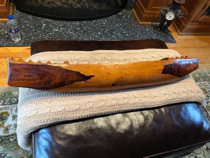 Hand carved wooden canoe