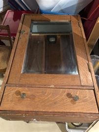 Antique medicine cabinet with drawer