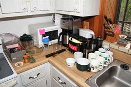 Microwave, Coffee Pot, Water Pitcher, Cups, Utensils