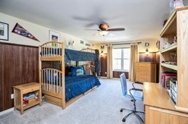 Contemporary light colored wood twin bed set with complimentary accent pieces.