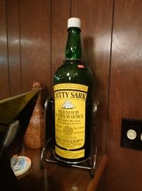 Huge glass bottle with stand