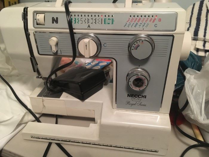 Necchi portable sewing machine.  Great shape.  Many stitches.  With case