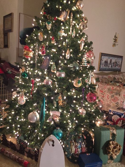Lots of presents under the 6’ tree.  Buy the tree fully decorated in vintage ornaments.  The bottom 1/2 comes with it for a 12’  beauty!