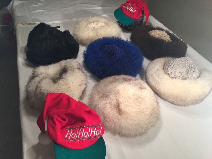 There’s a hat for everyone at the table - from warm and fun sheepskin and fox fur trimmed, rabbit fur ‘trappers hat’ to baseball ‘Santa hats’