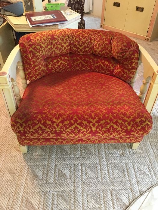 There are 2 of these vintage chairs that are exactly alike.