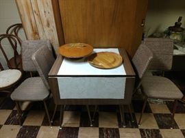 Awesome formica and vinyl kitchenette table with folding leaves and four chairs