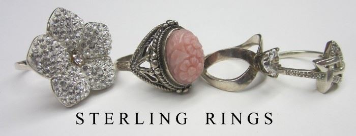Four Sterling silver rings 
