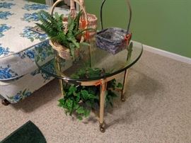 glass & brass tables that match. Paint those legs black!!