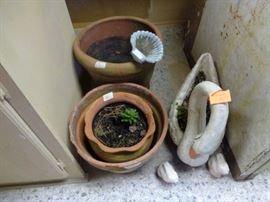 pots and concrete swan planter