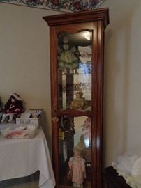curio cabinet, we have lots of dolls